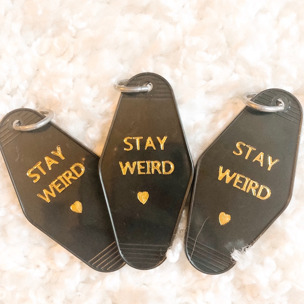 STAY WEIRD black vintage hotel keychain